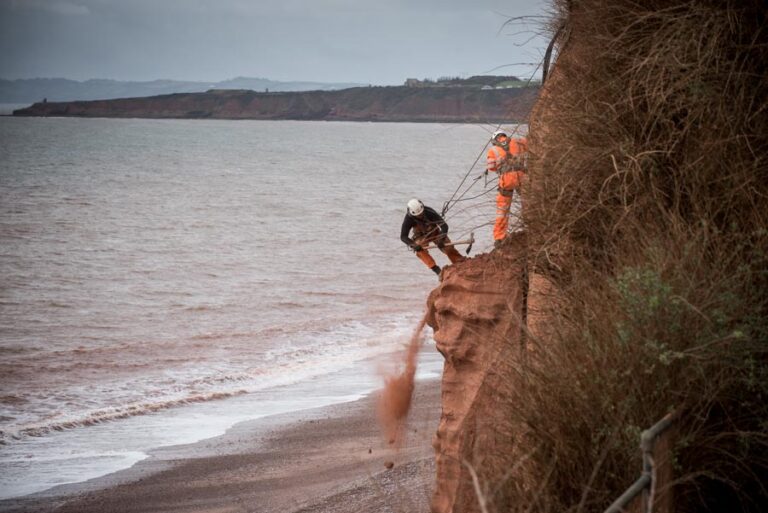 Specialist abseil team drafted in for essential cliff safety work at Budleigh Beach