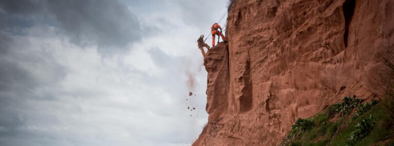Specialist abseil team drafted in for essential cliff safety work at Budleigh Beach